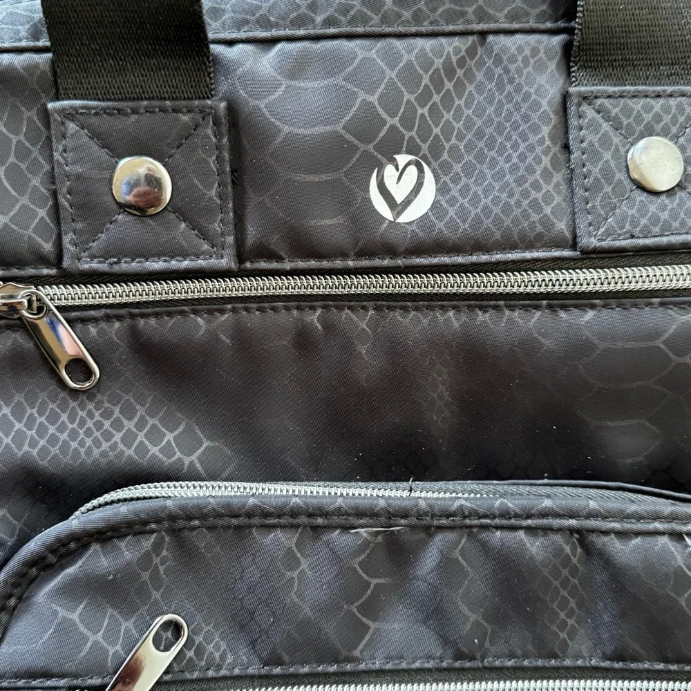 HeartSoul Bella Backpack black pebble with black straps.